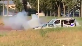 WATCH mask-clad men attack police van with stones & Molotovs in Paris suburb