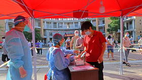 China’s Covid-19 cases soar ahead of week-long national holiday, some infections are vaccine-busting Delta