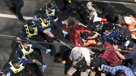 Elderly Australian woman knocked down & PEPPER-SPRAYED by police during Melbourne protest against lockdowns