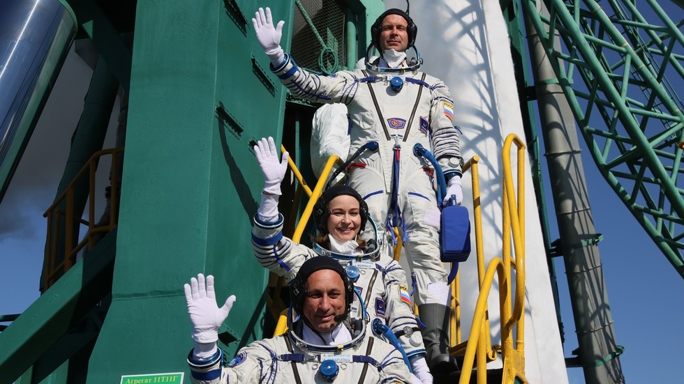 Rocket carrying Russian crew behind bid to shoot first ever feature-length film in space blasts off ahead of docking with ISS
