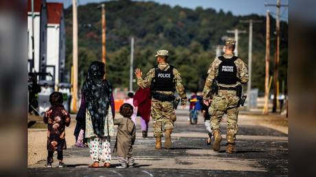 Hundreds of Afghan refugees walk away from US military bases to parts unknown rather than complete resettlement process – reports