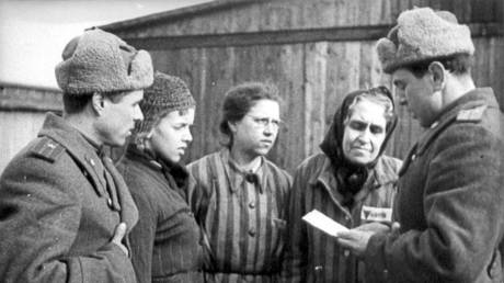 FILE PHOTO: Soviet soldiers are seen with some of the prisoners they liberated in the Nazi German Auschwitz death camp in Oswiecim, Poland, in this archival picture. © Reuters