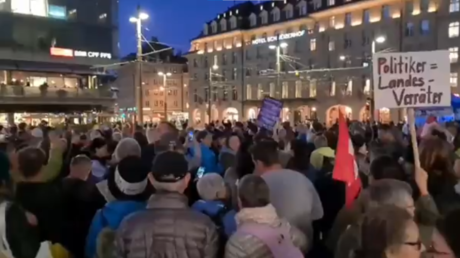 Swiss cops deploy water cannon & rubber bullets to break up 500-strong protest opposing Covid-19 health pass (VIDEOS)