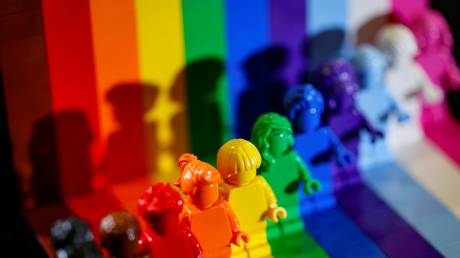 This picture taken on June 3, 2021 shows Danish toy brick maker Lego's 'Everyone is Awesome' new set of rainbow-coloured figurines to celebrate the diversity of its fans and the LGBTQI+ community. © THOMAS SAMSON / AFP