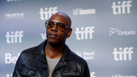 Dave Chappelle arrives for press conference for A Star is Born at the Toronto International Film Festival