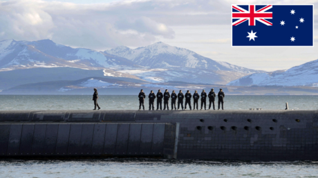 FILE PHOTO. British Navy personnel stand atop the Trident Nuclear Submarine, HMS Victorious, on patrol off the west coast of Scotland. © AFP / ANDY BUCHANAN