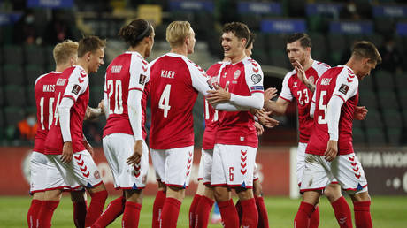 &lsquo;Scantily-clad excess&rsquo;: Denmark stars in pre-match &lsquo;pool party romp&rsquo; with female hotel staff as investigation launched