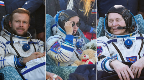 Filmmaker Klim Shipenko, actress Yulia Peresild and cosmonaut Oleg Novitsky are pictured after return from orbit on October 17, 2021.