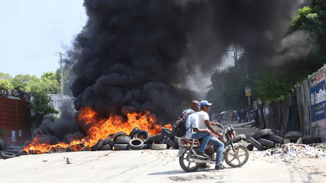 FILE PHOTO: Haitians stage a protest against kidnappings, days after the abduction of missionaries, in Port-au-Prince, in Haiti, on October 18, 2021.