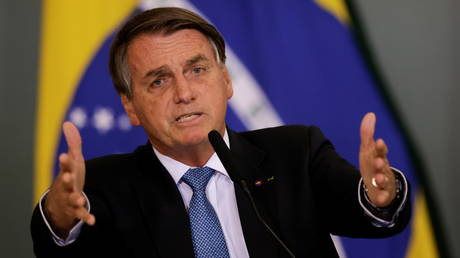 FILE PHOTO: Brazil's President Jair Bolsonaro gestures during an event at the Planalto Palace in Brasilia, Brazil, October 7, 2021.