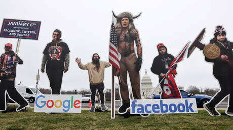 FILE PHOTO: An art installation protest by the organization Sumofus portrays Google CEO Sundar Pichai, Twitter CEO Jack Dorsey and Facebook CEO Mark Zuckerberg as January 6th rioters on the National Mall near the U.S. Capitol in Washington, U.S. March 25, 2021.