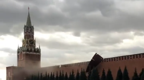 Moscow battered by gale force winds causing chaos on streets & even RIPPING DOWN scaffolding, damaging iconic Kremlin walls