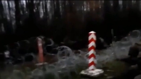 Two Polish border guards HOSPITALIZED as migrants stuck in no man&rsquo;s land on Belarusian frontier for months attempt to storm fence