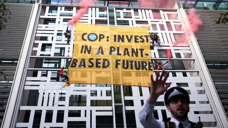 WATCH Animal Rebellion activists scale government building in London demanding UK &lsquo;defund meat&rsquo;