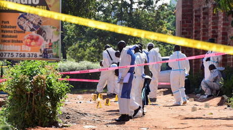 FILE PHOTO: Ugandan explosives experts secure the scene of the October 24, 2021 blast in Komamboga, a suburb of Kampala. © REUTERS / Abubaker Lubowa