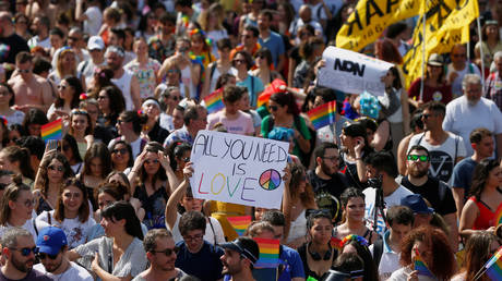 People take part in the Gay Pride Parade in Rome, Italy, June 8, 2019. © REUTERS / Yara Nardi