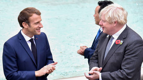 French President Emmanuel Macron and UK Prime Minister Boris Johnson at a G20 summit in Rome, October 31, 2021. Andreas Solaro / AFP