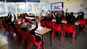 UK’s decision to allow schools to return in September kept cases high despite infections falling among adults – study