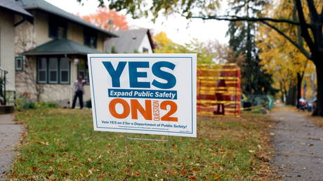 FILE PHOTO. A “Yes on 2” sign stands in a front yard ahead of the vote on the future of the police department in Minneapolis, US on October 28, 2021.