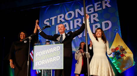 New Jersey Governor Phil Murphy (center) addresses supporters at election night event in Asbury Park, November 3, 2021.