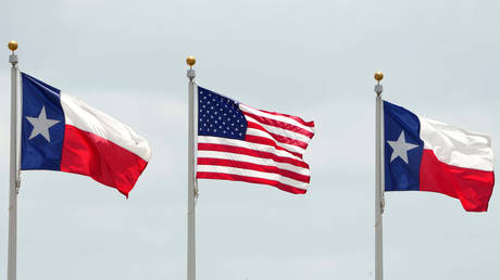 College Station, Texas, USA; United States and State of Texas flags during the NCAA West Preliminary at E.B. Cushing Stadium