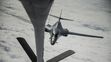 FILE PHOTO: A US B-1B Lancer and a KC-135 Stratotanker conduct aerial refueling over the East China Sea, January 9, 2018.