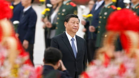 Chinese President Xi Jinping arrives for a ceremony at the Monument to the People's Heroes on Tiananmen Square to mark Martyrs' Day, in Beijing, China September 30, 2021. © Reuters / Carlos Garcia Rawlins