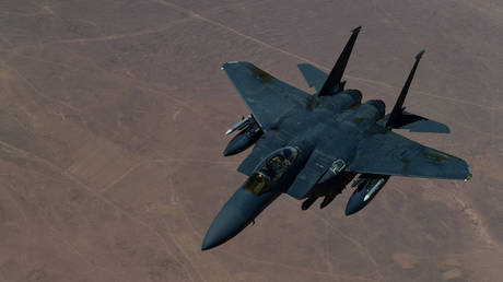 A US Air Force F-15E Strike Eagle descends after receiving fuel at an undisclosed location in the Gulf, August 9, 2019