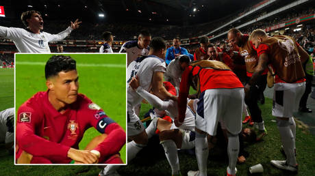 Cristiano Ronaldo (inset) watched Serbia celebrate after beating Portugal © Twitter / skysportsnews | © Pedro Nunes / Reuters