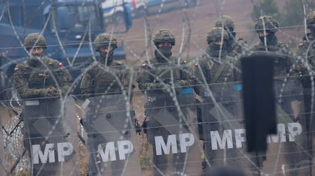 FILE PHOTO: Polish military police on the Belarusian-Polish border. © Oksana Manchuk / BelTA via REUTERS