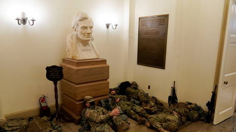 National Guard members sleep at the U.S. Capitol, in Washington, U.S., January 13, 2021