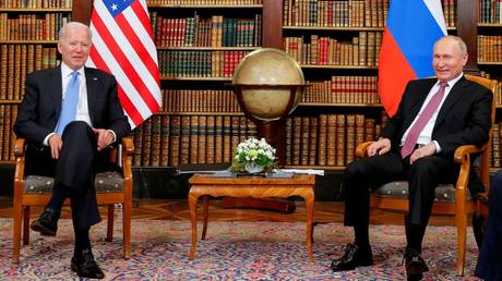 FILE PHOTO: Vladimir Putin and Joe Biden meet for the US-Russia summit in Geneva, Switzerland, on June 16, 2021.