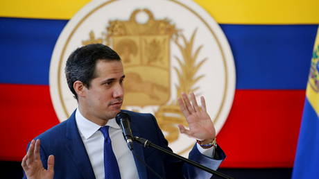 Venezuela's opposition leader Juan Guaido addresses the media after regional and local elections, in Caracas, November 22, 2021.