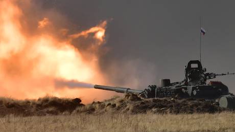 A Russian T-72 B3 tank fires during the Peace Mission 2021, a counterterrorism military exercise for Shanghai Cooperation Organization (SCO) member states, at Donguz training area in Orenburg Region, Russia.