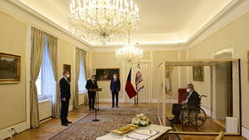 Covid-positive Czech president appoints PM from inside big glass box