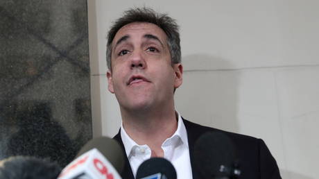 FILE PHOTO: Michael Cohen, former lawyer to then-President Donald Trump, speaks to the media as he leaves his apartment to report to prison in Manhattan, New York, May 6, 2019.