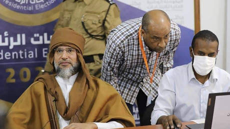 Seif al-Islam (L). © AP / Libyan High National Elections Commission