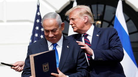Israel's Prime Minister Benjamin Netanyahu stands with US President Donald Trump after signing the Abraham Accords, September 15, 2020
