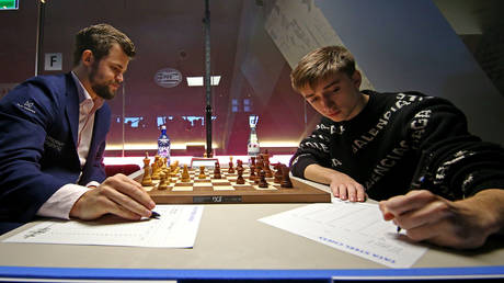Magnus Carlsen was helped by Russia's Daniil Dubov. © Getty Images