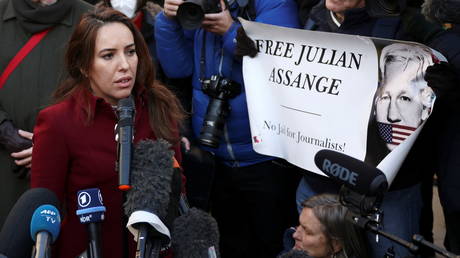 Stella Moris, partner of Wikileaks founder Julian Assange, speaks to media outside the Royal Courts of Justice following the appeal against Assange's extradition in London, December 10, 2021