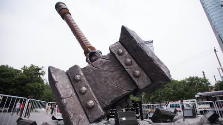 FILE PHOTO. The Doom Hammer being displayed during the Warcraft movie theme exhibition at Sanlitun in Beijing, China. © Getty Images / Zhong Zhenbin