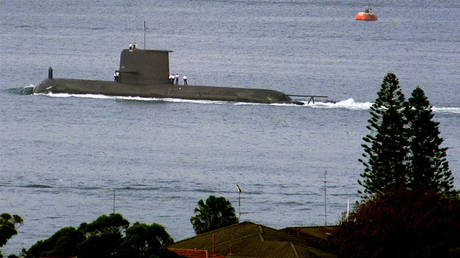 FILE PHOTO: The Royal Australian Navy's Collins class submarine, HMAS Waller, leaves Sydney Harbour on May 4, 2000.