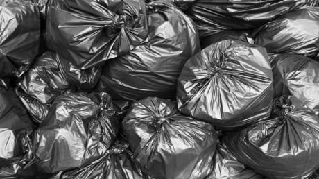 Major British bank fined for laundering trash bags full of cash