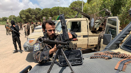 FILE PHOTO: A militiaman loyal to Libya's GNU in Tripoli, July 6, 2020.