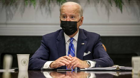 US President Joe Biden meets with members of the White House Covid-19 Response Team in Washington, December 16, 2021.