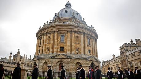 Honorands and senior university members take part in the annual Encaenia ceremony at Oxford University. September 22, 2021. © AFP / Tolga Akmen