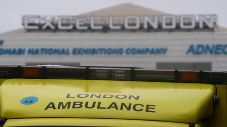 FILE PHOTO. An ambulance is parked outside NHS Nightingale Hospital. ©REUTERS / Hannah McKay