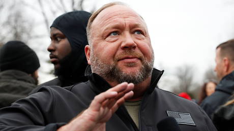 Alex Jones is shown at an event in Washington on the eve of last January's US Capitol riot.