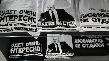 Clothes with quotes from Lukashenko on them in the Castle Shopping Center in Minsk, Belarus. © Sputnik / Viktor Tolochko