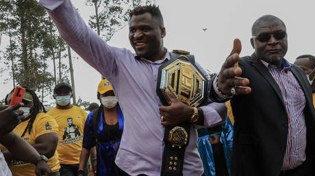 UFC champ Francis Ngannou (left) is looking forward to the AFCON in Cameroon © Daniel Beloumou Olomo / AFP